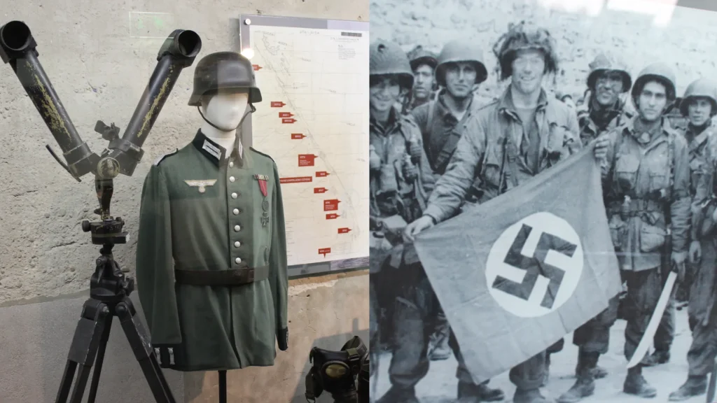 A museum exhibit featuring a world war ii german uniform and equipment, alongside a large photograph of soldiers holding a nazi flag.