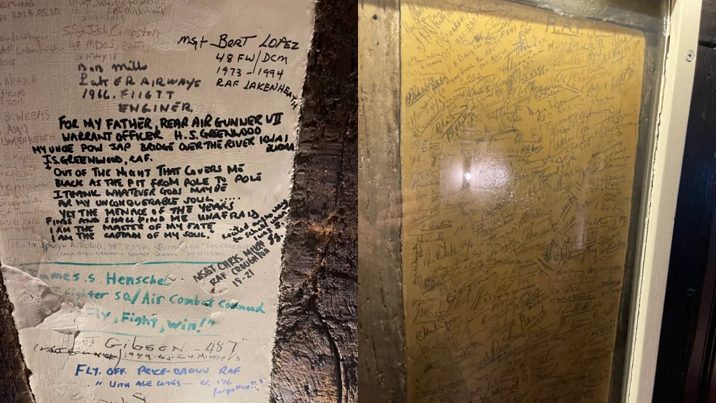 A photo showing two walls covered in scribbled signatures and handwritten messages, reflecting a tradition of visitors leaving their mark in a dimly lit space.