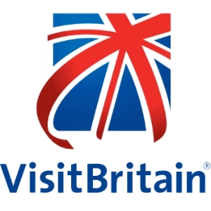 Logo of Visit Britain featuring a stylized union jack in red, white, and blue with the words 