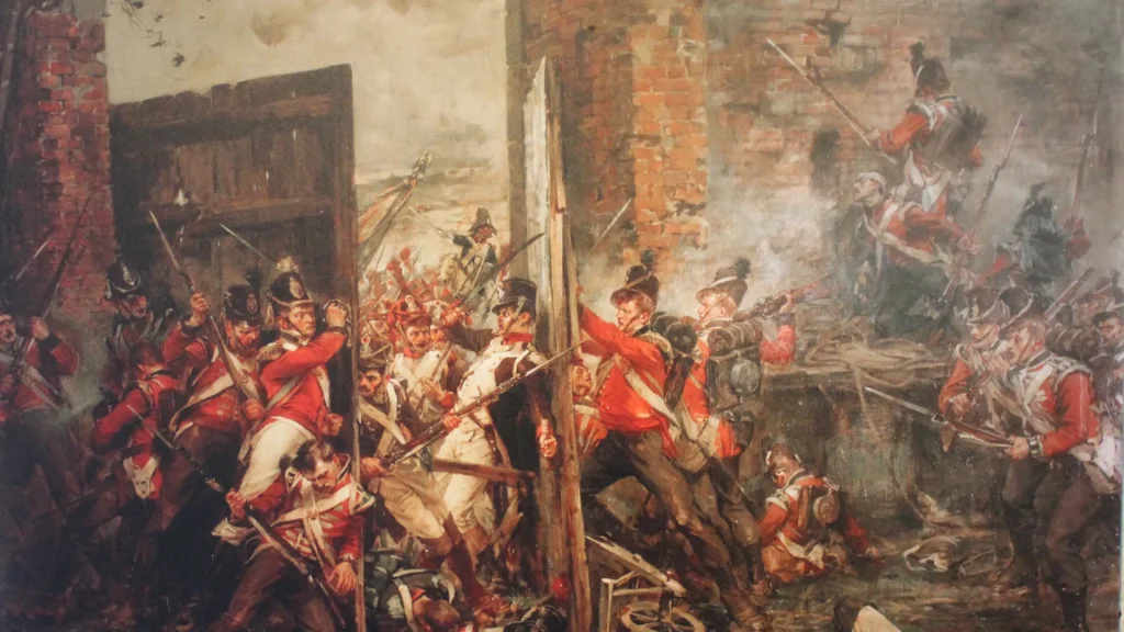A dramatic historical painting depicting a fierce battle scene with soldiers in red uniforms fighting amongst rubble and broken walls.